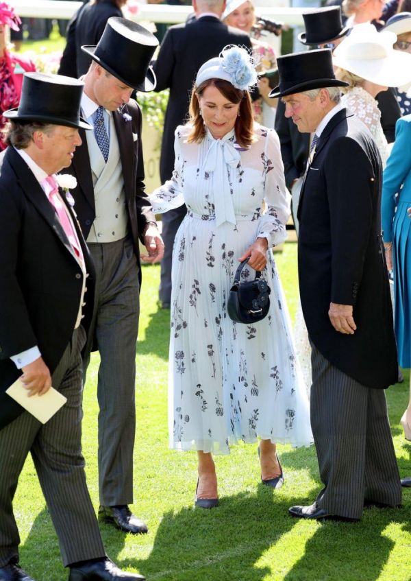 Prince William chats with Carole and Michael Middleton at Royal Ascot